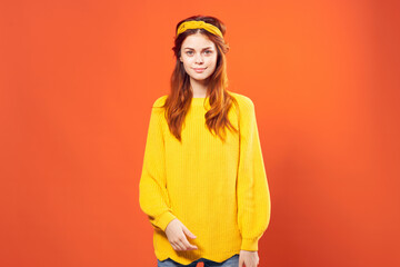 woman in yellow sweater with headband fashion hippie retro clothing