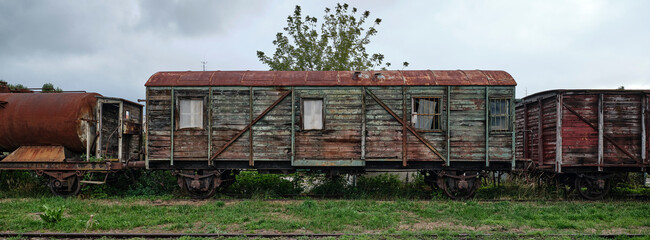 Old historic train depot rusty wagon side view
