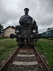 Old historic train depot black locomotive front view