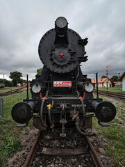 Old historic train depot black locomotive front view
