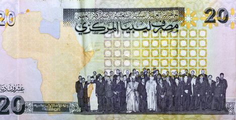 Reverse side of 20 twenty Libyan dinars banknote currency issued 2009 by the central bank of Libya Map of Libya with Muammar al-Ghaddafi with OAU members 1999, vintage retro, old Libyan money banknote