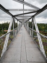 Fototapeta na wymiar Steel bridge over old historic train depot