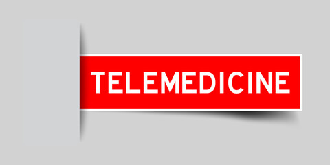 Label sticker red color in word telemedicine that inserted in gray background