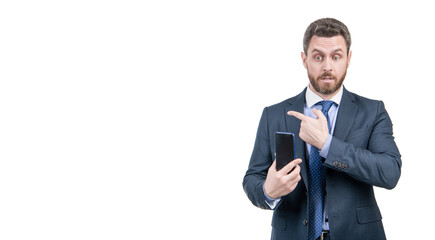 Business professional man hold mobile phone pointing finger for copy space, advertising