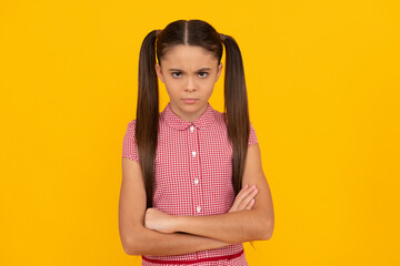 Being in capricious mood. Stubborn child yellow background. Girl with stubborn character - obrazy, fototapety, plakaty