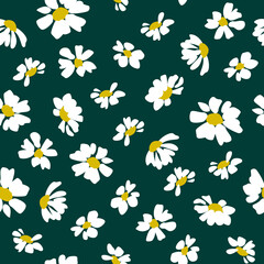 Seamless pattern. Chamomile flowers on a green background.
