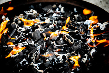 burning charcoal for shish kebabs wood coals ash burning coals in the grill shish kebabs recreation...
