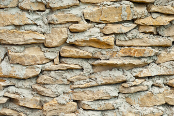 Texture of brick wall and concrete blocks. Samples of stone plates stacked evenly in a row.