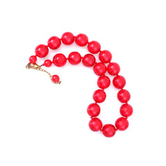 Red round beads isolated on white background
