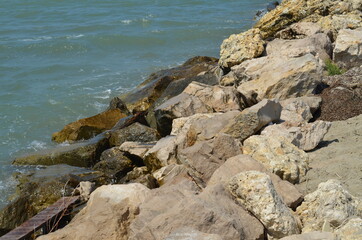Fototapeta na wymiar Light color rocks, stones - Sea Coast - granit