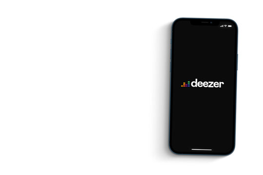 Deezer music  app on the smartphone screen isolated on white background. Top view. Rio de Janeiro, RJ, Brazil. August 2021.
