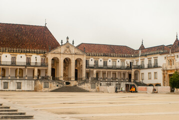 Obraz premium University of Coimbra Faculty of Law at the empty Paco das Escolas Square on a cloudy day - Coimbra, Portugal