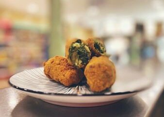 spinacon croquettes with pine nuts