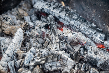 Burning coals close up, background top view