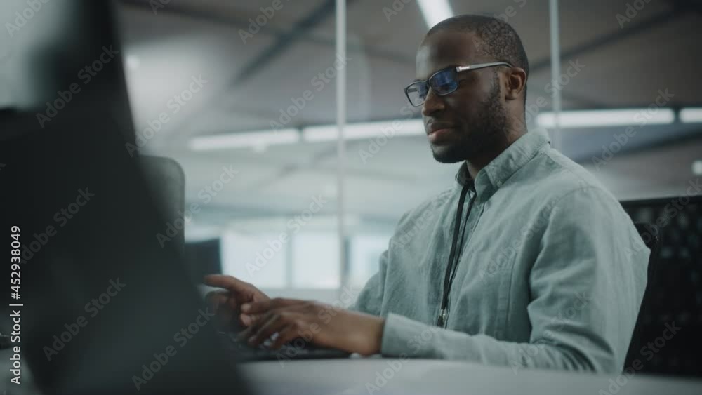 Poster Real Office: Professional Black IT Programmer Working on Desktop Computer. Male Website Developer and Software Engineer Developing App, Video Game. Progressive, Innovative and Inspirational Person