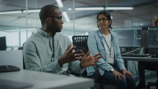 Real Office: Professional Black IT Programmer Working on Desktop Computer. Male Website Developer and Software Engineer Developing App, Video Game. Progressive, Innovative and Inspirational Person