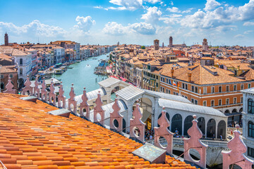 Rialto Bridge above Grand Canal. View from rooftop lookout terrace of the Fondaco dei Tedeschi....