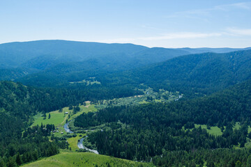 Fototapeta premium Beautiful river valley with lovely meadows on a sunny day