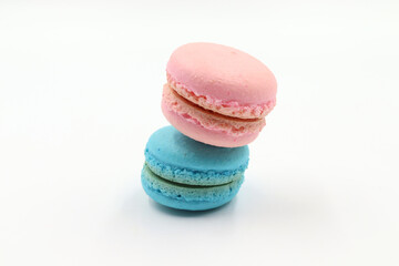 Blue and Pink Macarons on white background