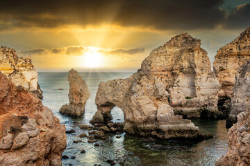 Cliffs and rocky caverns in Ponta da Piedade, Lagos - Algarve, Portugal. Beautifull cliffs at...