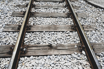 Railway tracks in nature. Travel and transportation. Close up of Railroad tracks.