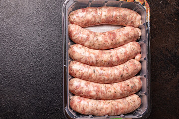 raw sausages meat pork, beef, idea, chicken, lamb fresh portion ready to eat meal snack on the...