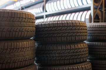 A new tire is placed on the tire storage rack in tire factory. Be prepared for vehicles that need to change tires.