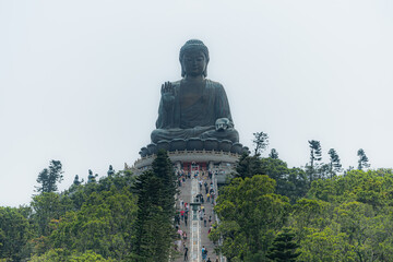 Fototapeta premium Tian Tan Buddha statue (Big Buddha) at Ngong Ping in Lantau Island. landmark and popular in Hong Kong 