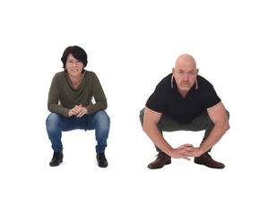 a couple squatting over white background