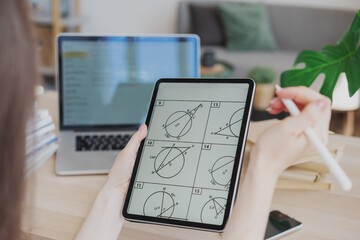 Female student solving geometry and mathematics using tablet and laptop, online education and...