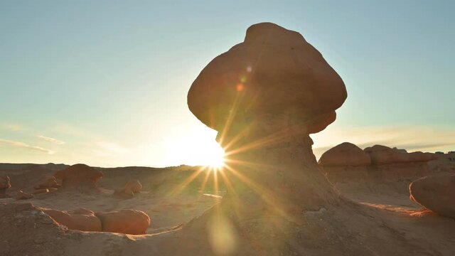 Mushroom-shaped Rock Formation Backlit Sunlight At Goblin Valley State Park Near Hanksville, Utah In United States. - Zoom In
