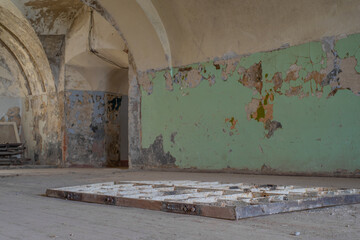 Interior of the abandoned Patarei prison (Patarei Vangla). Window bars on the ground. Tallinn,...