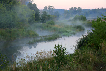 Obraz na płótnie Canvas morning fog over river