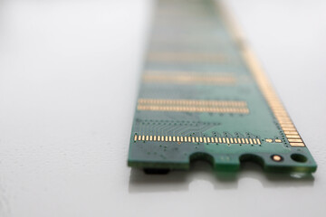 close up of computer memory board on white table background