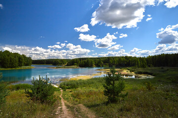 Fototapeta na wymiar Beautiful summer landscape near lake with blue water. Lake Key in the Nizhny Novgorod region.