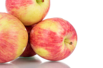 Fototapeta na wymiar Three juicy organic apples , close-up, isolated on white.