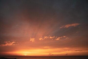 colourful orange and pink sunset over the sea