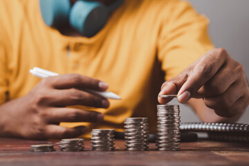 Businessman showing business growth money chart to analyze global market finances save money to start a business.
