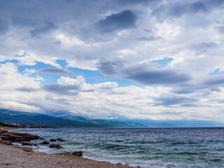 Waves on the beach with bays and rocks in Croatia