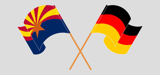 Crossed and waving flags of the State of Arizona and Germany