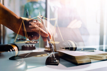Business and lawyers discussing contract papers with brass scale on desk in office. Law, legal services, advice, justice and law concept picture with film grain effect