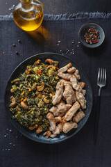 Green kale salad with chicken on plate