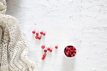 This photo depicts of lingonberry on white background. Copy space