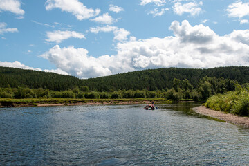 Fototapeta na wymiar rafting down a mountain river