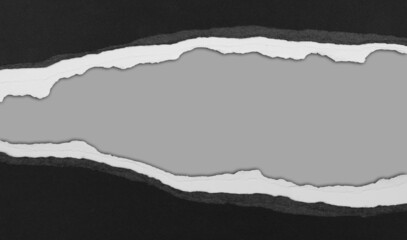 Ripped paper on grey