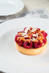 dessert tartlet with raspberries and caramel