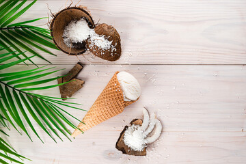 Fototapeta na wymiar coconut ice cream on a white wooden background