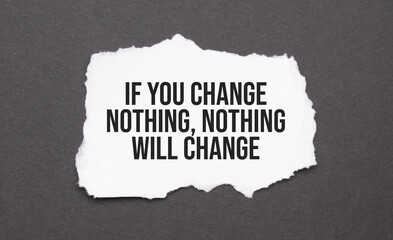 if you change nothing, nothing will change sign on the torn paper on the black background