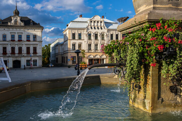 Naklejka premium Market Square and fountain in the afternoon sunshine