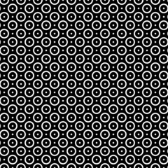 Fototapeta na wymiar Vector illustration. Geometric seamless pattern. Solid dots and rhombus-shaped linear circles. Spotted black and white background. Simple black and white abstract pattern.